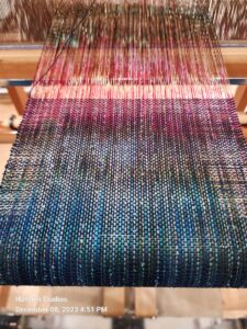 dyed warp on loom